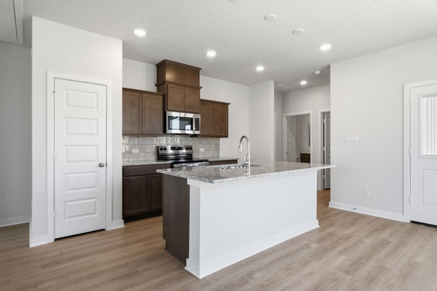 Furnished interior view inside a new home in The Cottages at Pagosa Springs, Bryan (Image 3).