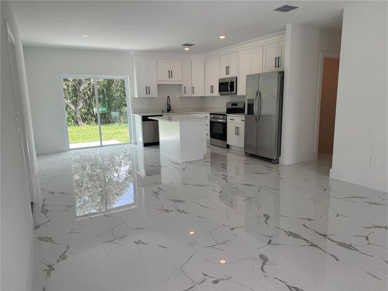 Furnished interior view inside a new home in , Dunnellon (Image 5).
