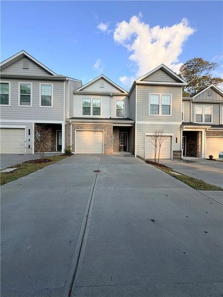 Front exterior of a new home in Morning Creek Forest, South Fulton, GA, highlighting curb appeal (Image 2).
