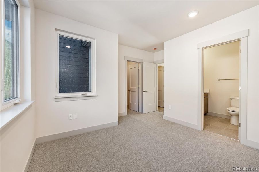 Not actual unit. Pictures are from another unit in the development. Primary bedroom