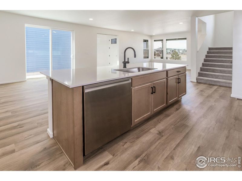 KITCHEN OPEN TO DINING AND LIVING ROOM KITCHEN OPEN TO DINING AND LIVING ROOM