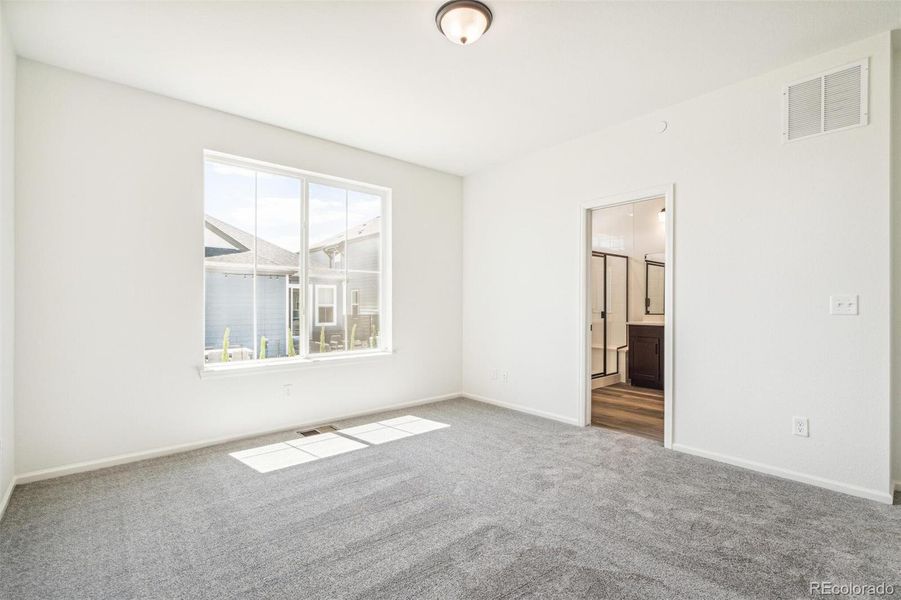 Spacious, unfurnished interior of a new home in Legato, Commerce City (Image 28).