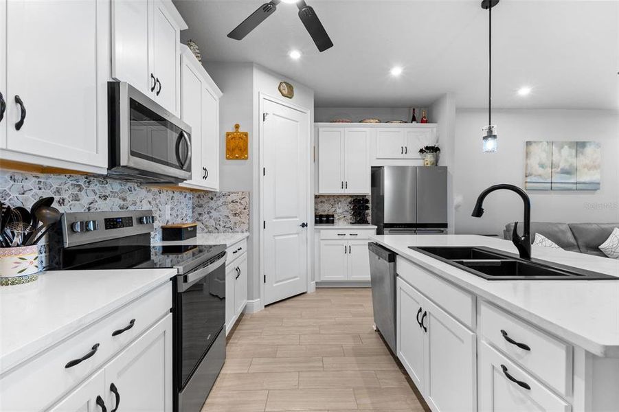 Furnished interior view inside a new home in Windwater, Parrish (Image 11).