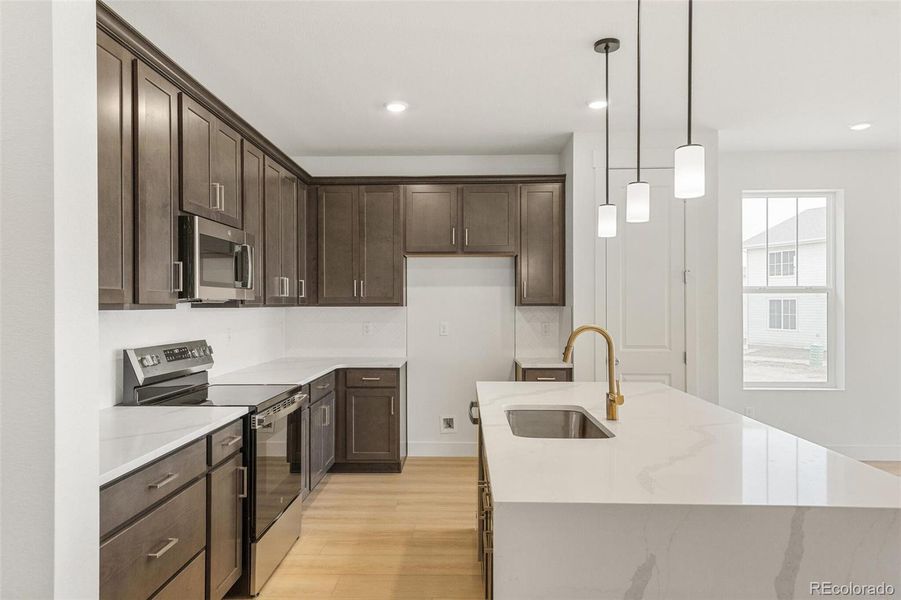 Furnished interior view inside a new home in Painted Prairie, Aurora (Image 8).