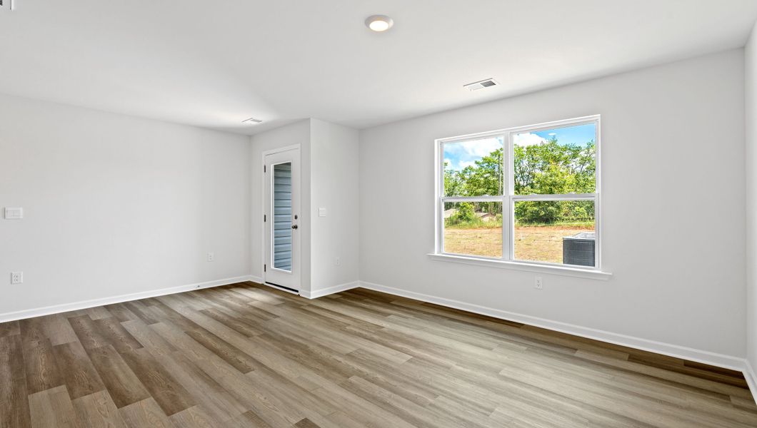 Spacious, unfurnished interior of a new home in Chestnut Ridge Townhomes, Greenville (Image 13).