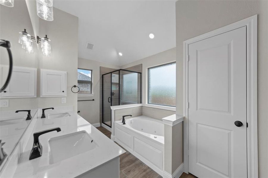 Dual vanity with undermount sinks and black fixtures