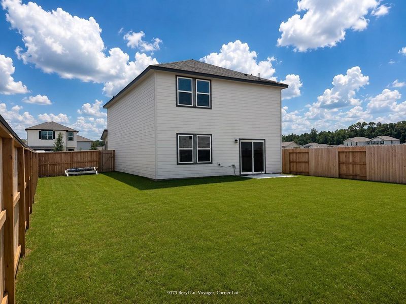 Exterior details and patio area of a home in Stonebrooke, Conroe (Image 3).