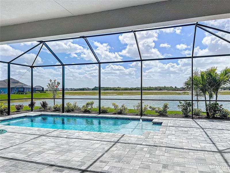 Exterior details and patio area of a home in Watercolor Place, Bradenton (Image 28).