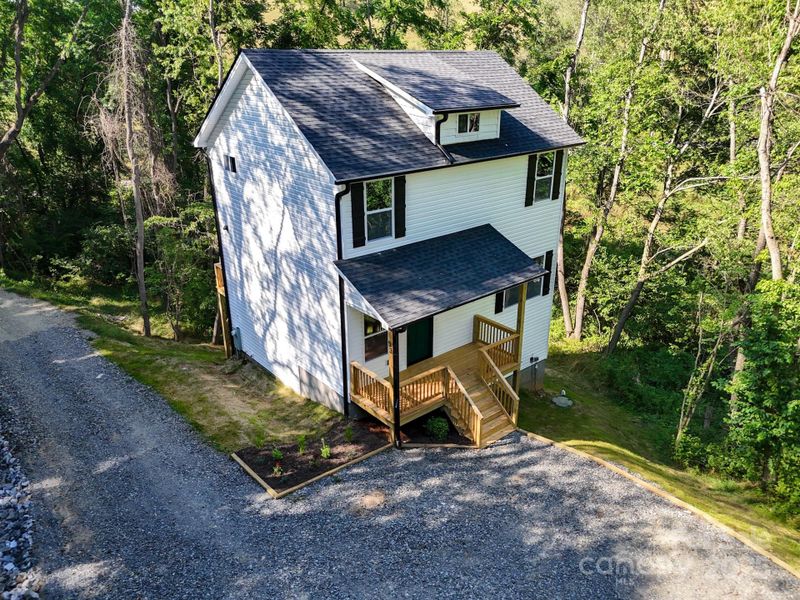 Front exterior of a new home in , Waynesville, NC, highlighting curb appeal (Image 21). Front exterior of a new home in , Waynesville, NC, highlighting curb appeal (Image 21).