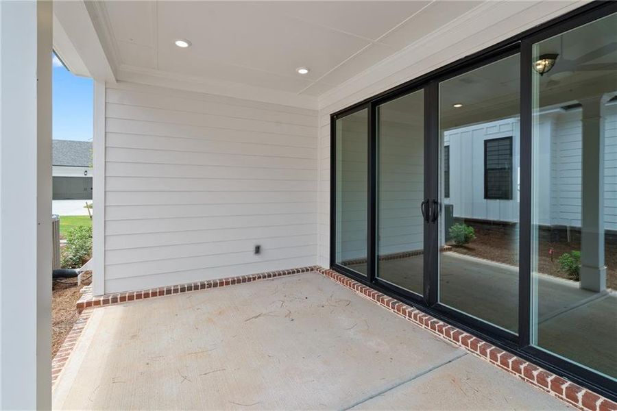 Exterior details and patio area of a home in Promenade at Sawnee Village, Cumming (Image 4).