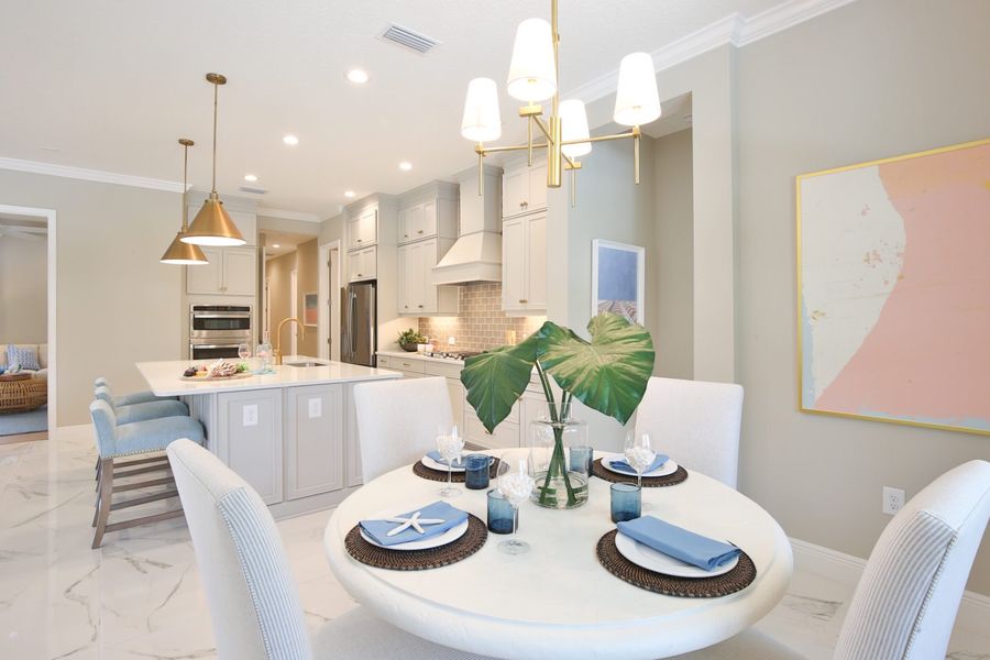 Furnished interior view inside a new home in Boca Royale Golf & Country Club at Wellen Park, Englewood (Image 10).