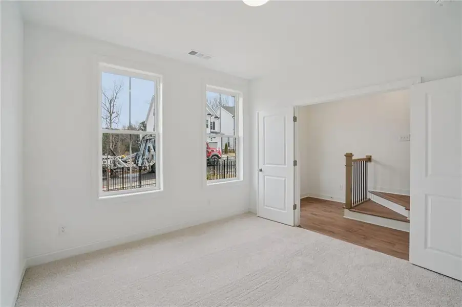 Spacious, unfurnished interior of a new home in Waterhaven, Cumming (Image 28).