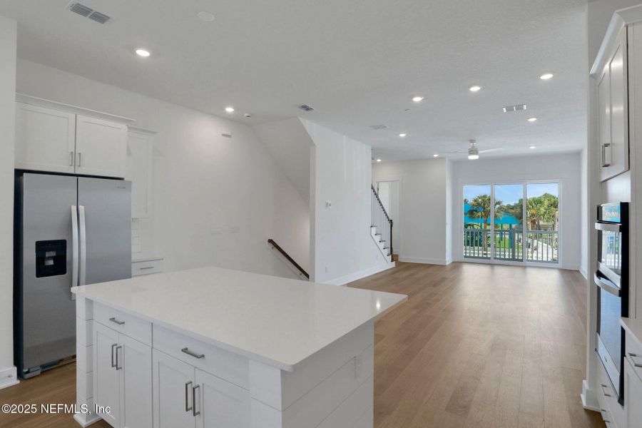 Furnished interior view inside a new home in North Beach Townhomes, Jacksonville Beach (Image 11).