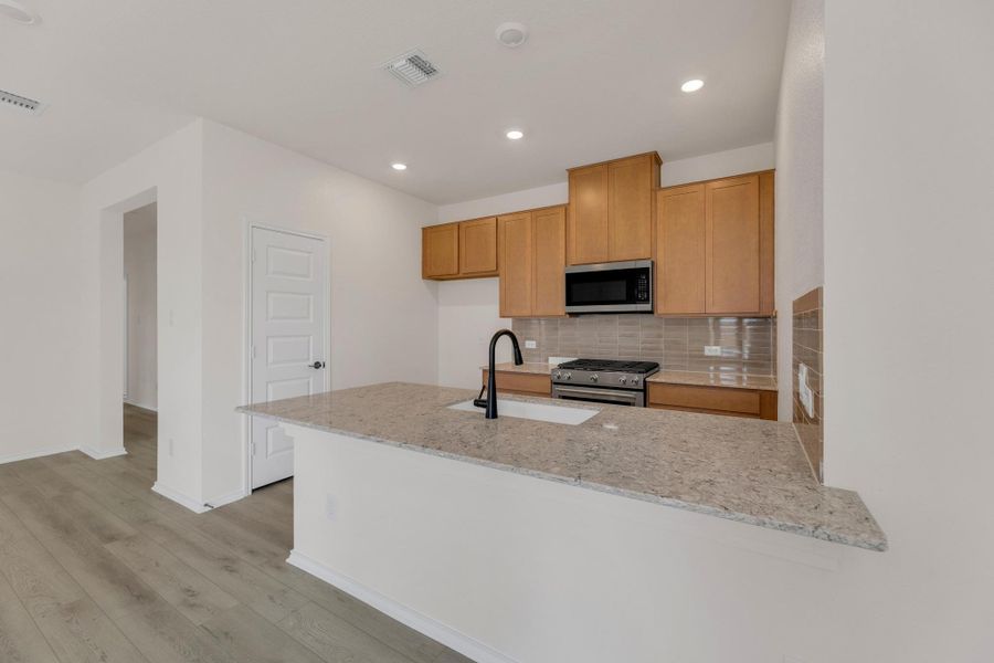 Furnished interior view inside a new home in Salerno - Heritage Collection, Round Rock (Image 6). Furnished interior view inside a new home in Salerno - Heritage Collection, Round Rock (Image 6).