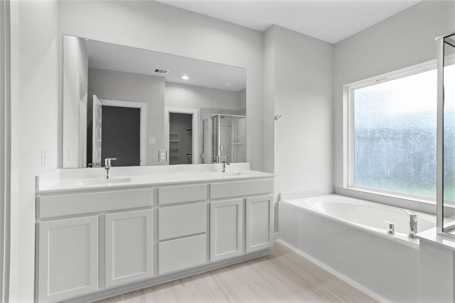 Furnished interior view inside a new home in Forest Village, Spring (Image 14).