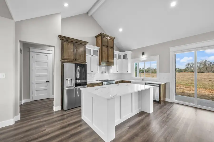 Furnished interior view inside a new home in , New Waverly (Image 6).