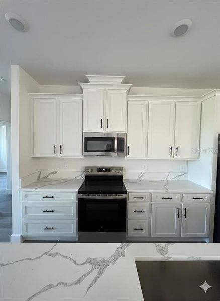 Furnished interior view inside a new home in , Port Charlotte (Image 7).