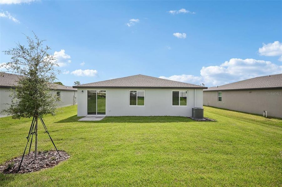 Exterior details and patio area of a home in The Reserve at Van Oaks, Auburndale (Image 20).