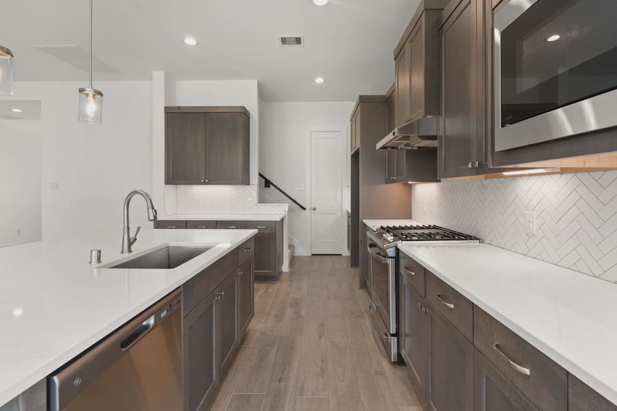 Representative furnished interior of a home built from the Gianna by Chesmar Homes in The Highlands, Porter (Image 6).