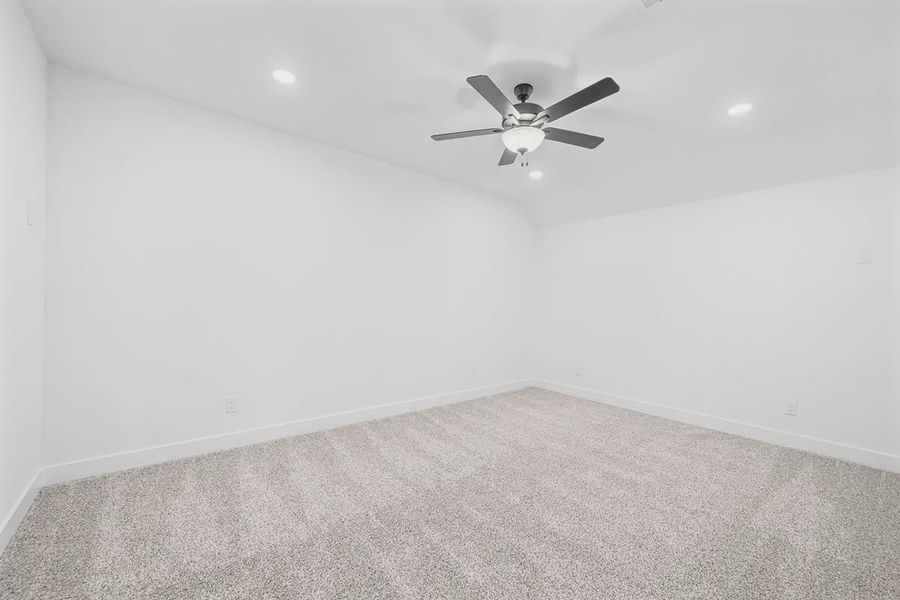 Representative unfurnished interior of a home built from the Madison by Chesmar Homes in Grange, Katy (Image 37).