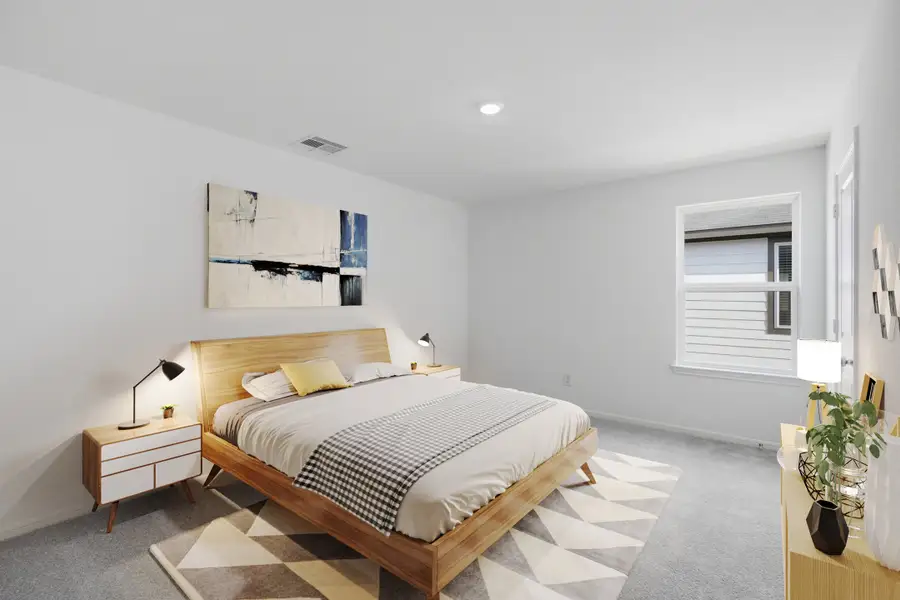 Representative furnished interior of a home built from the Walnut by Taylor Morrison in Raburn Reserve 50s, Tomball (Image 14).