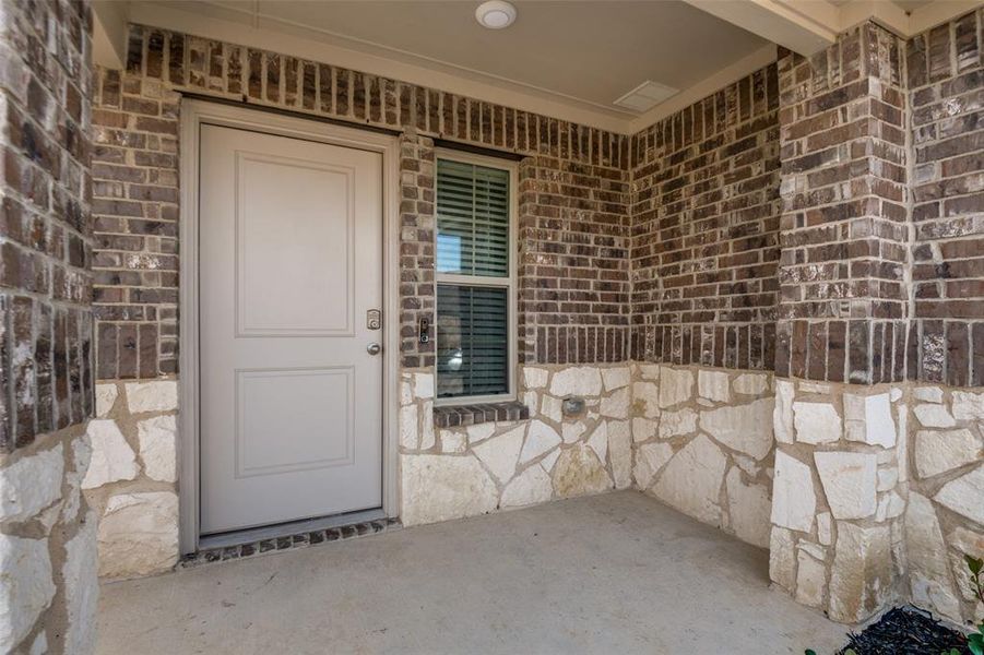 Exterior details and patio area of a home in Wildcat Ranch, Crandall (Image 3).