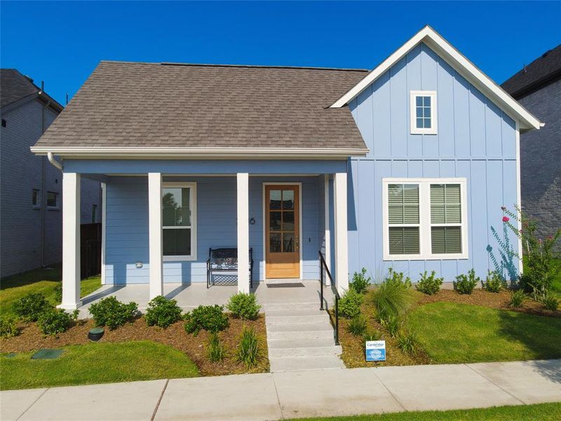 Front exterior of a new home in , Rowlett, TX, highlighting curb appeal (Image 21).