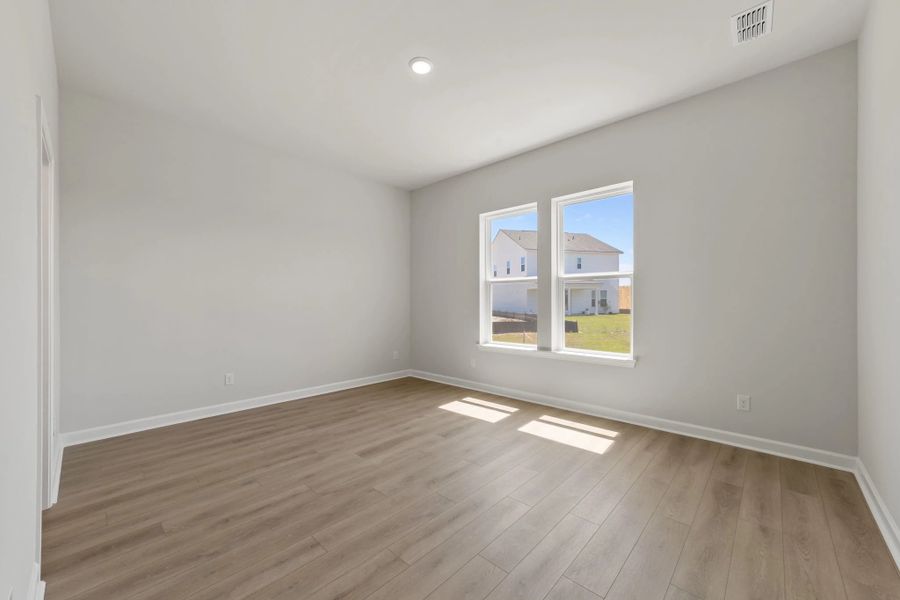 Spacious, unfurnished interior of a new home in Blue Heron Retreat, Little River (Image 17).