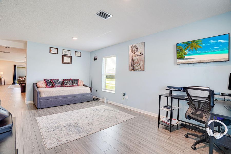 Furnished interior view inside a new home in Celebration Pointe, Fort Pierce (Image 8).