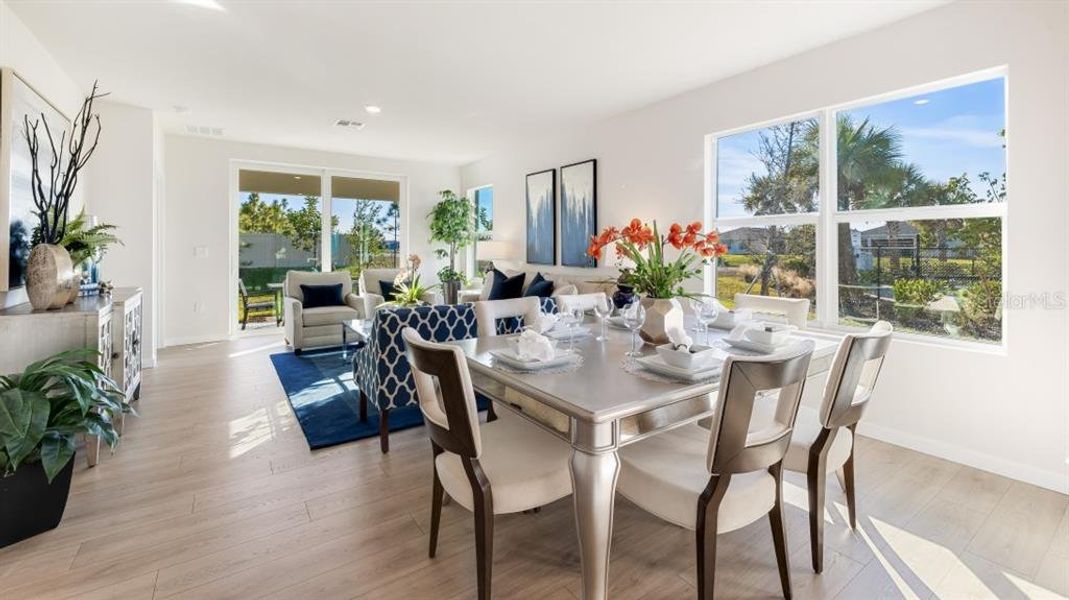 Furnished interior view inside a new home in Cove at West Port - Express, Port Charlotte (Image 6).