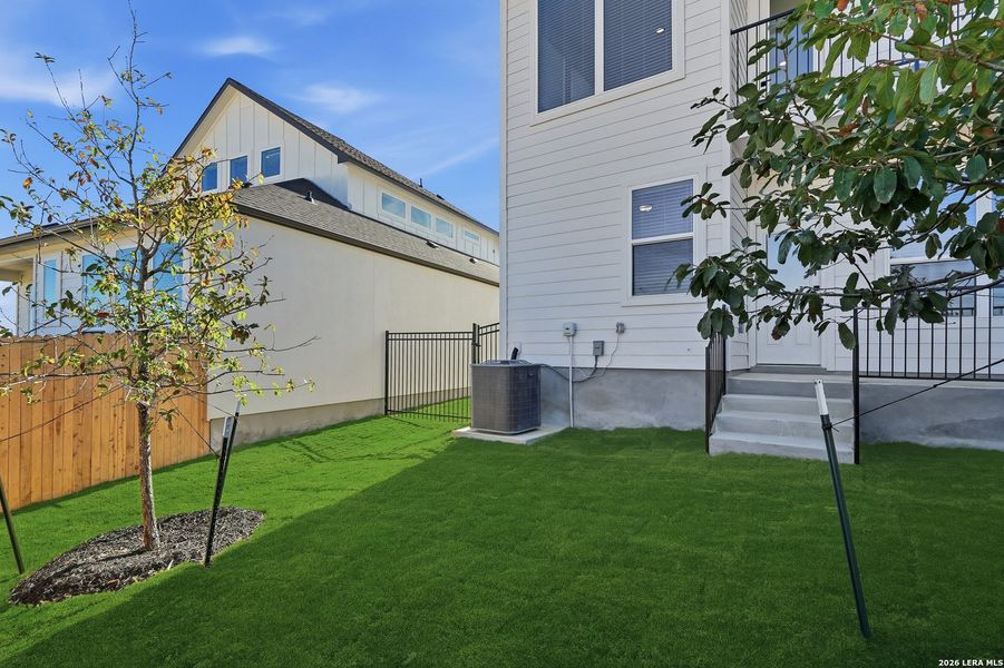 Exterior details and patio area of a home in Prominence, San Antonio (Image 3).