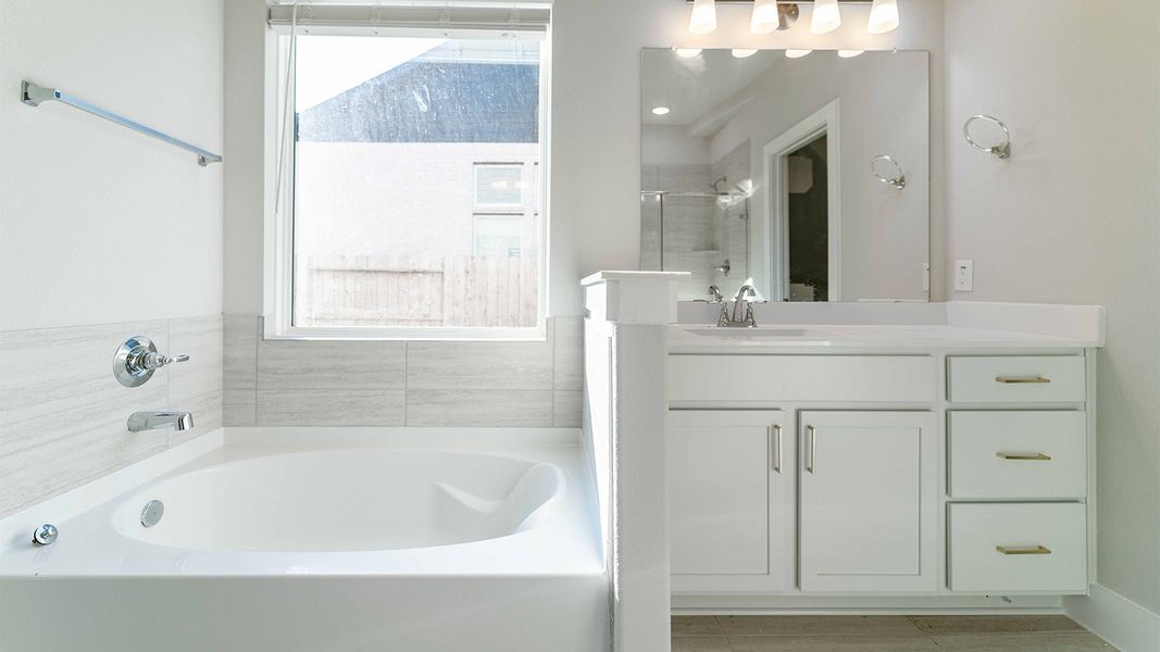Furnished interior view inside a new home in Sunterra, Katy (Image 5).