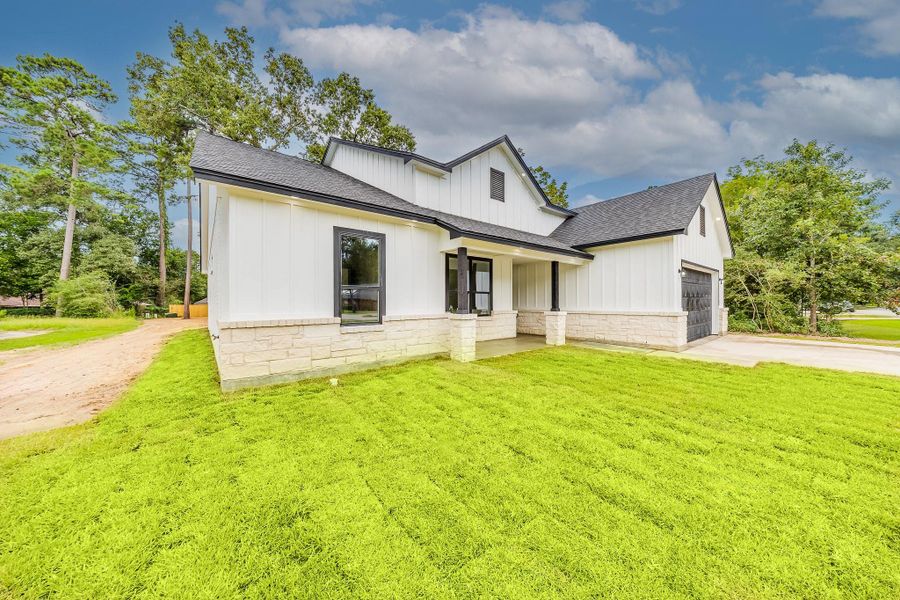 Beautiful home with a white and brick facade, offering classic curb appeal and timeless architectural charm. Beautiful home with a white and brick facade, offering classic curb appeal and timeless architectural charm.