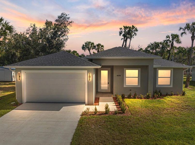Front exterior of a new home in , North Port, FL, highlighting curb appeal (Image 18).