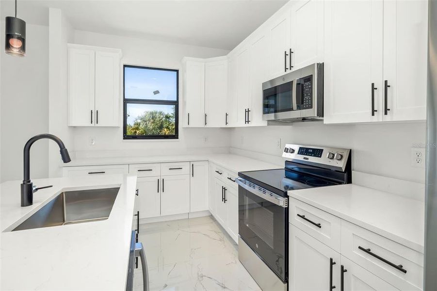 Furnished interior view inside a new home in , Port Charlotte (Image 14).