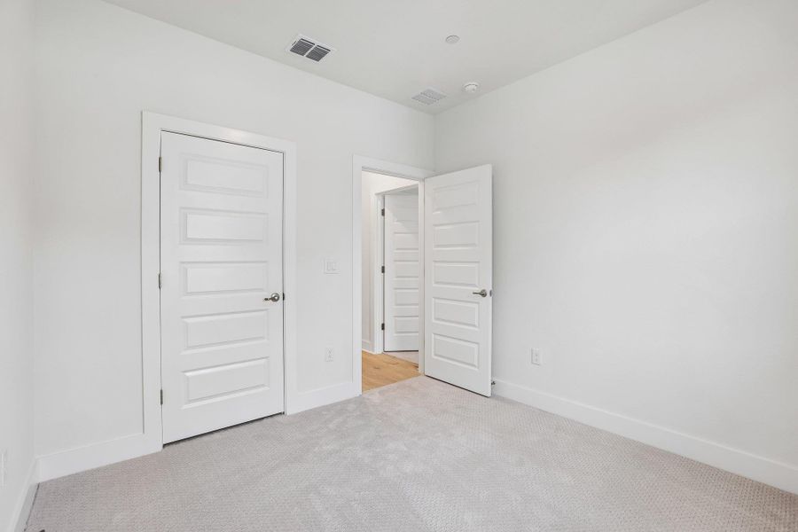The first of the bedrooms has a walk-in closet.