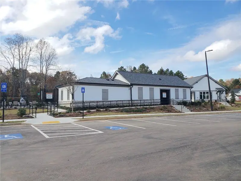 Front exterior of a new home in Twin Lakes, Hoschton, GA, highlighting curb appeal (Image 18).