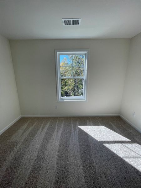 Spacious, unfurnished interior of a new home in Springwood Grove, Central (Image 21).