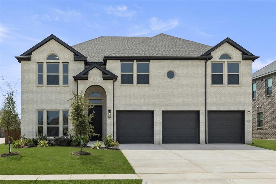 Front exterior of a new home in Grayhawk Addition, Forney, TX, highlighting curb appeal (Image 25). Front exterior of a new home in Grayhawk Addition, Forney, TX, highlighting curb appeal (Image 25).