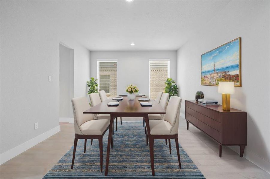 Make memories gathered around the table with your family and friends! This dining room features high ceilings, custom paint, large windows with privacy blinds and recessed lighting.