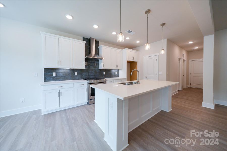 Kitchen also features upgraded cabinets with 42" upper cabinets and under cabinet lighting