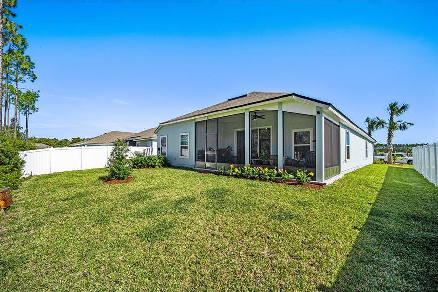 Exterior details and patio area of a home in Sawmill Branch, Palm Coast (Image 4).