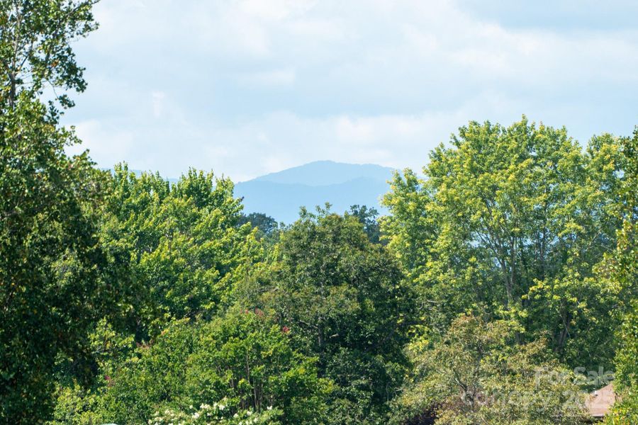 A peek-a-boo mountain in the distance. A peek-a-boo mountain in the distance.