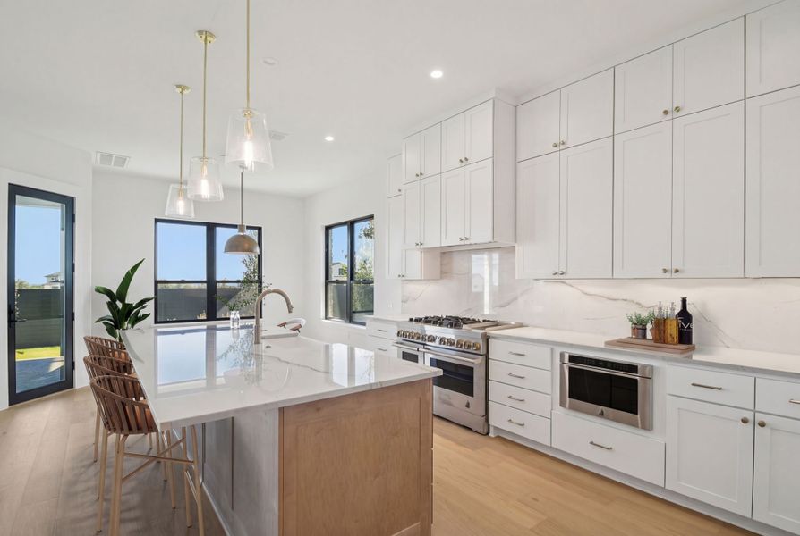 Furnished interior view inside a new home in Milky Way at River Place, Austin (Image 6).
