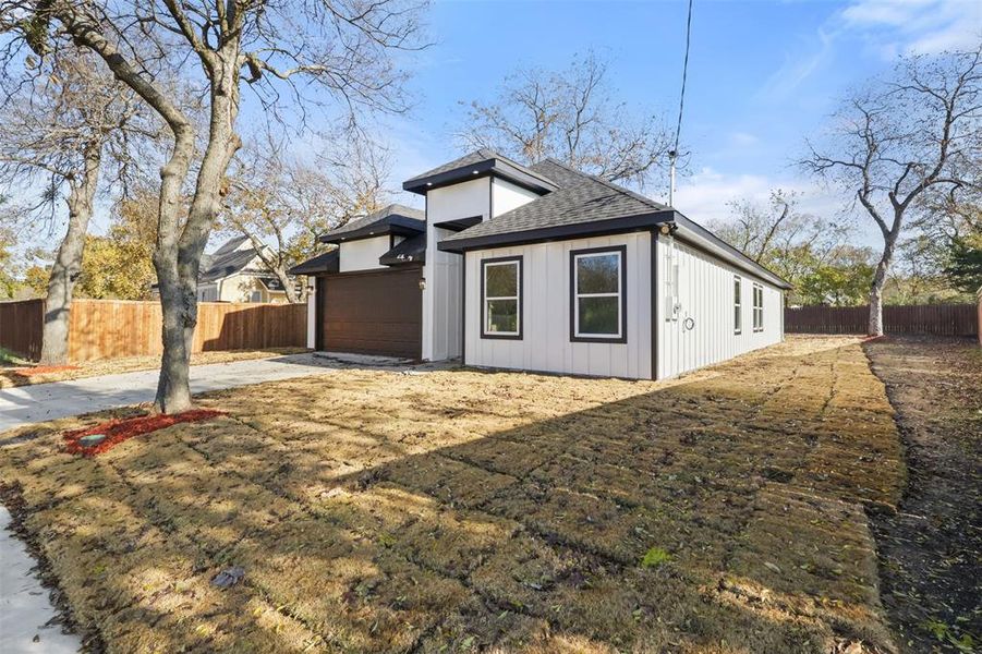 View of home's exterior with a garage