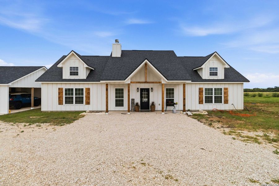 Front exterior of a new home in , Sabinal, TX, highlighting curb appeal (Image 23).