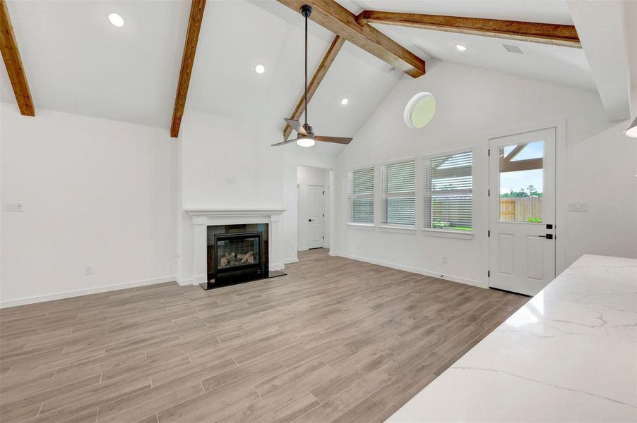 Open great room with cozy fireplace