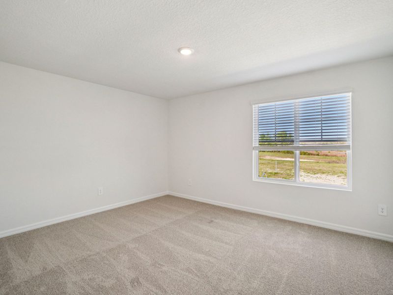 Spacious, unfurnished interior of a new home in Two Rivers - Classic Series, Zephyrhills (Image 18).