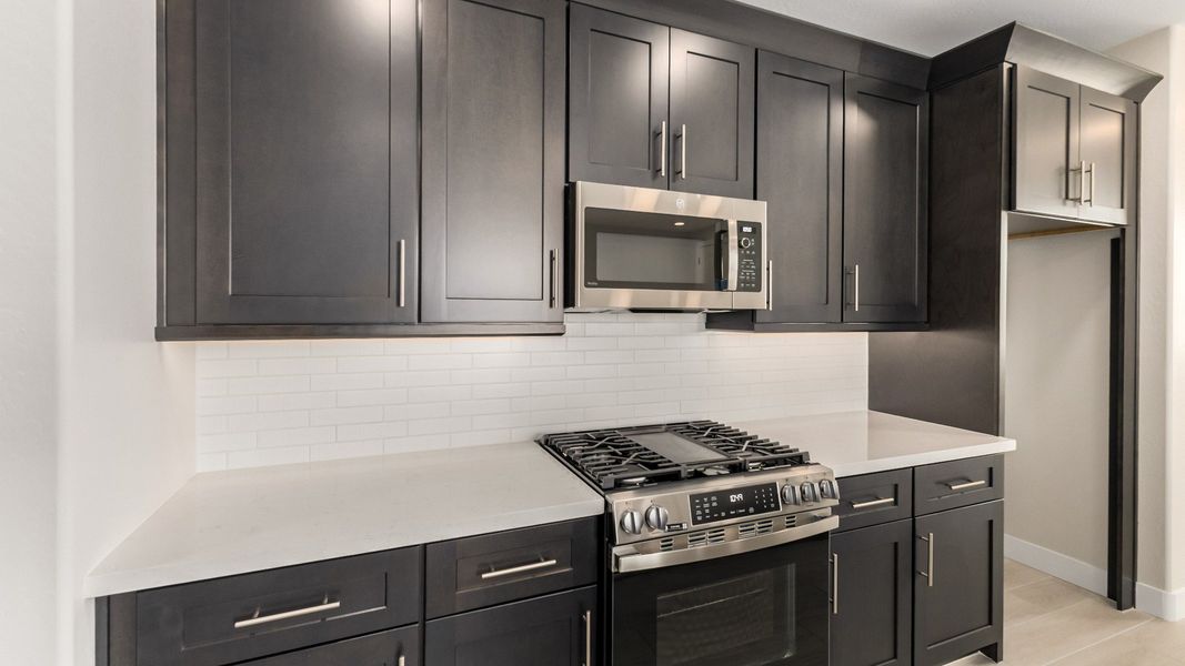 Representative furnished interior of a home built from the The Delaney by DRB Homes in Surprise City Center, Surprise (Image 11).