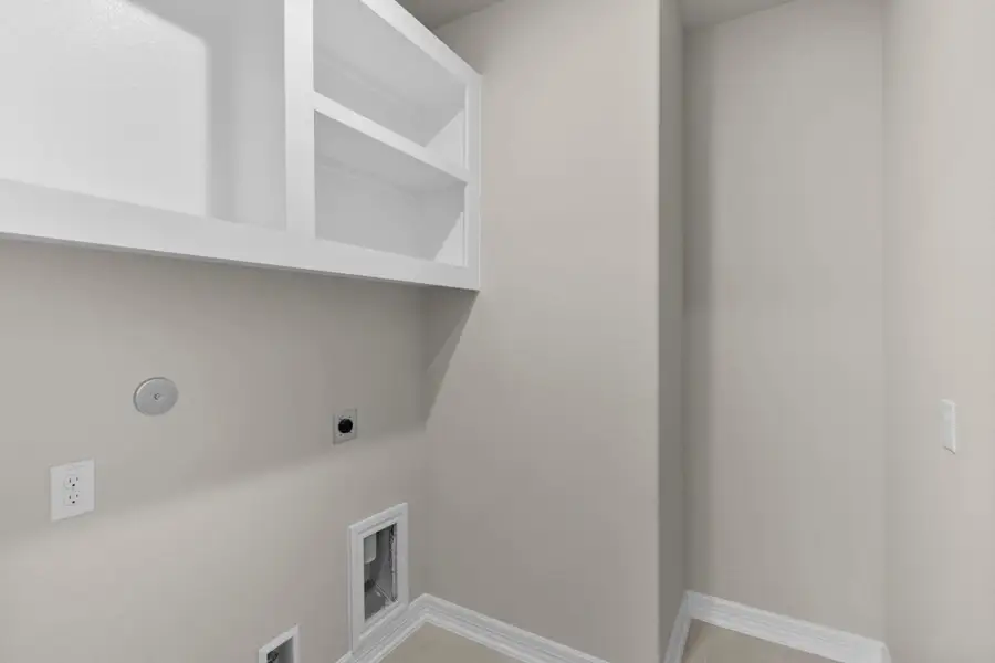 Laundry room. Sample product photo. Actual exterior and interior selections may vary by homesite. Photo may be virtually staged.